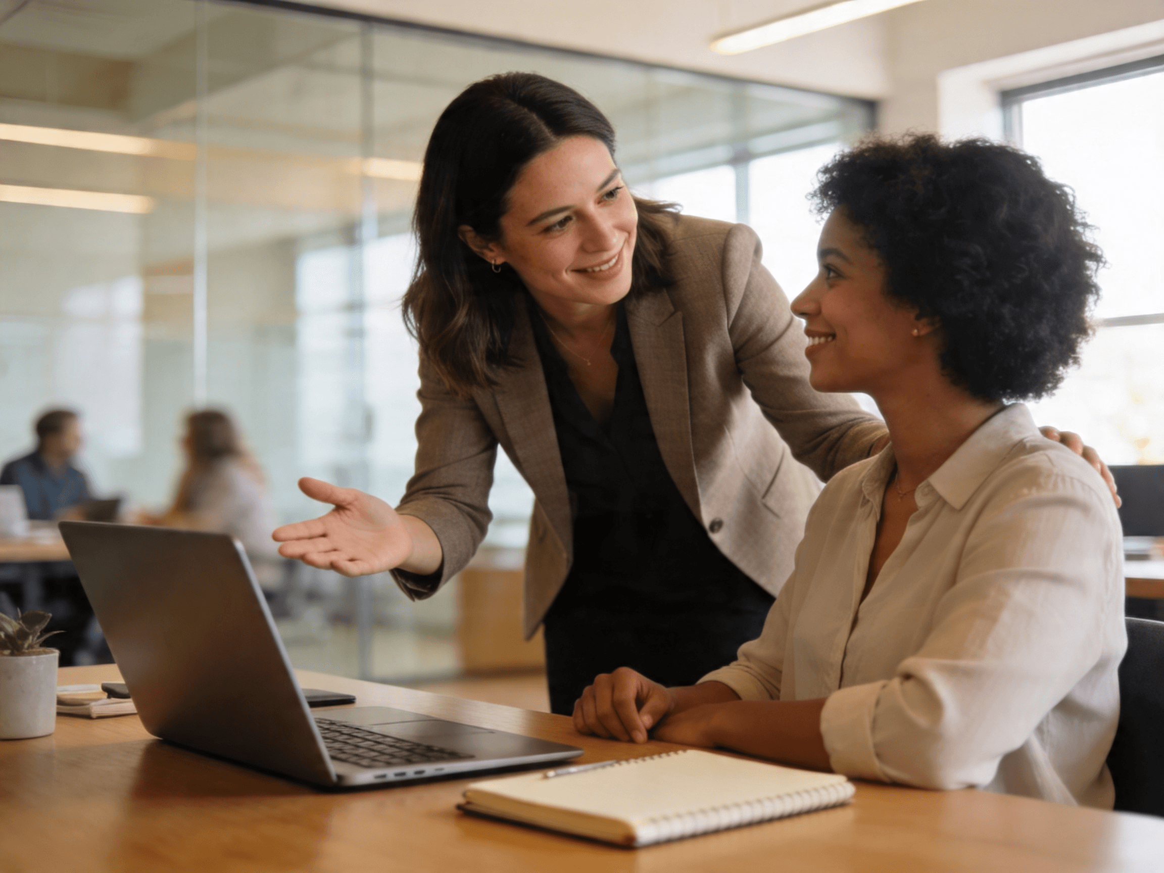 A supportive manager speaking clearly and respectfully with a colleague at work